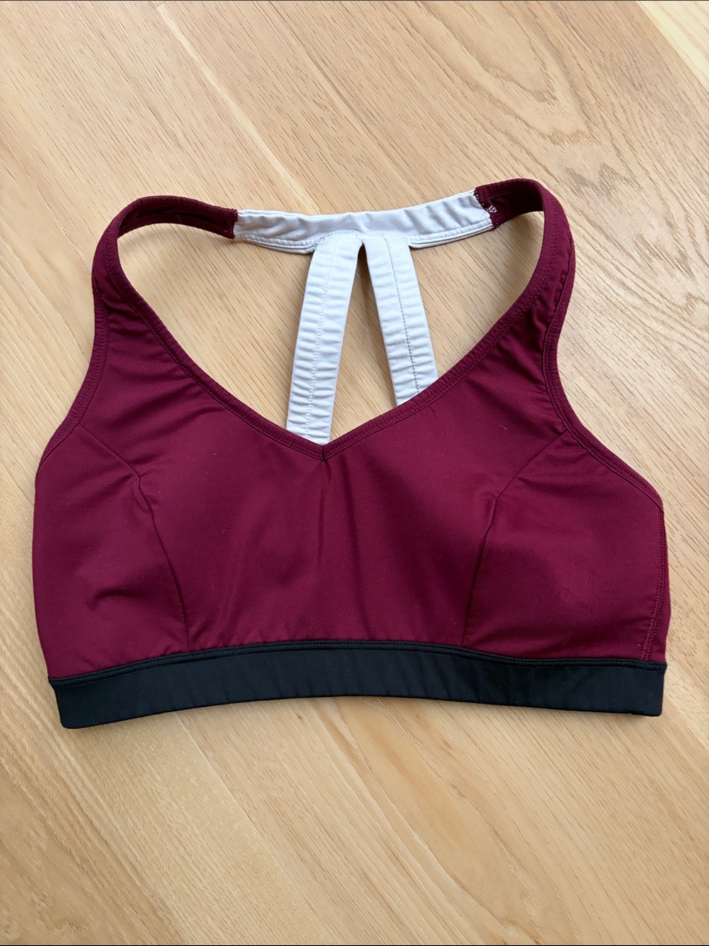 Women’s Burgundy Sports Bra with White Strappy Back and Black Band